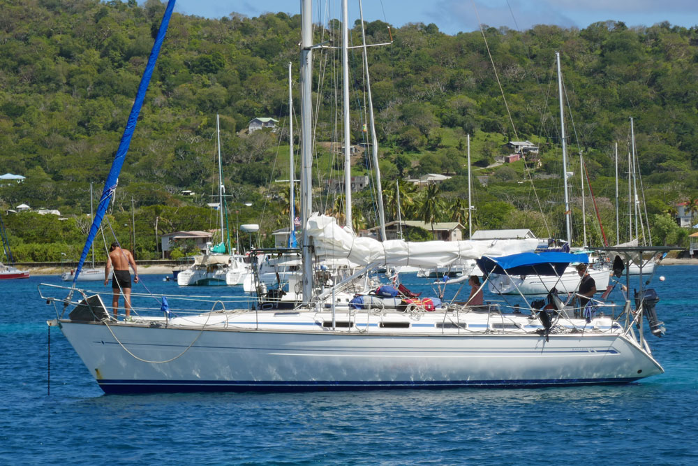 A Bavaria Match 42 sailboat prepares to weigh anchor