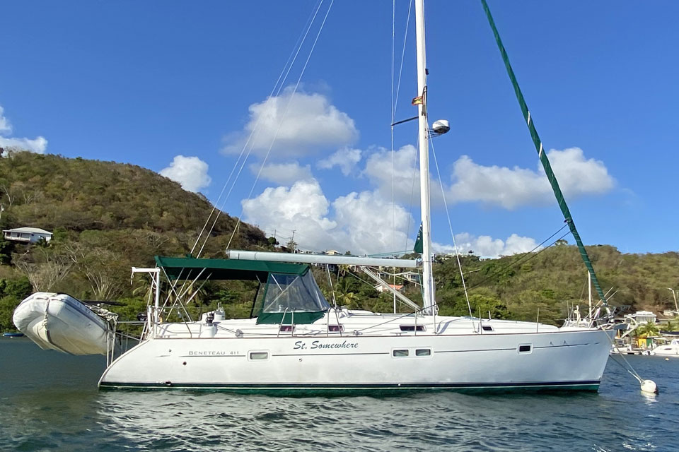 A Beneteau 411 sailboat at anchor