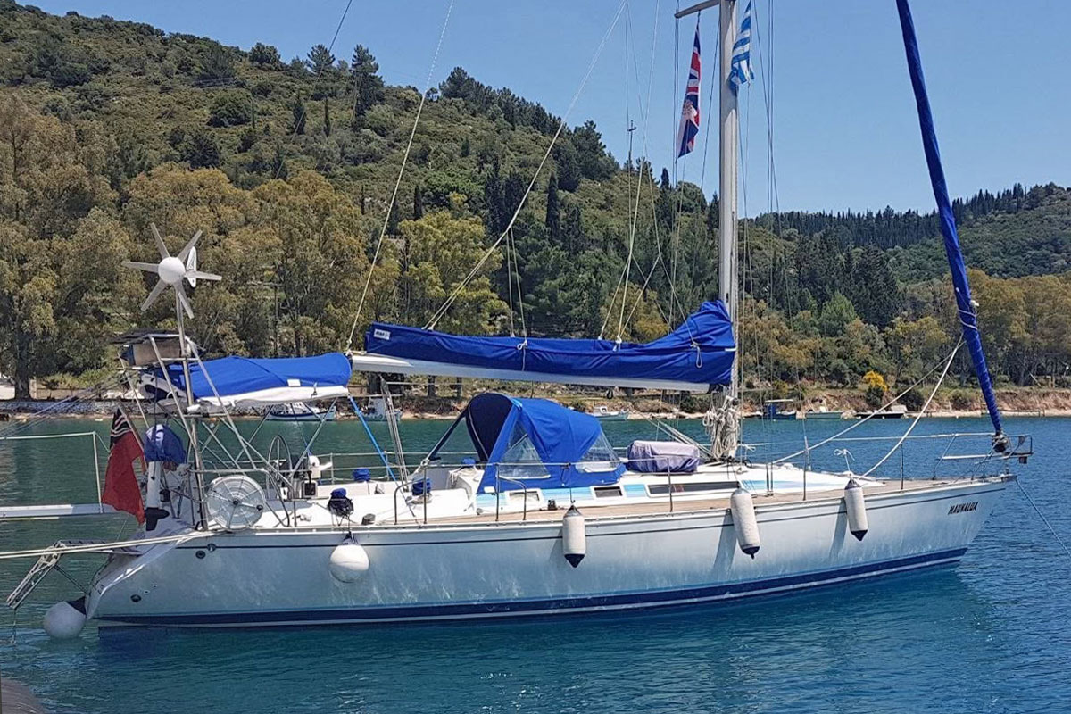 A Beneteau First 405 Sailboat stern-to in a slip