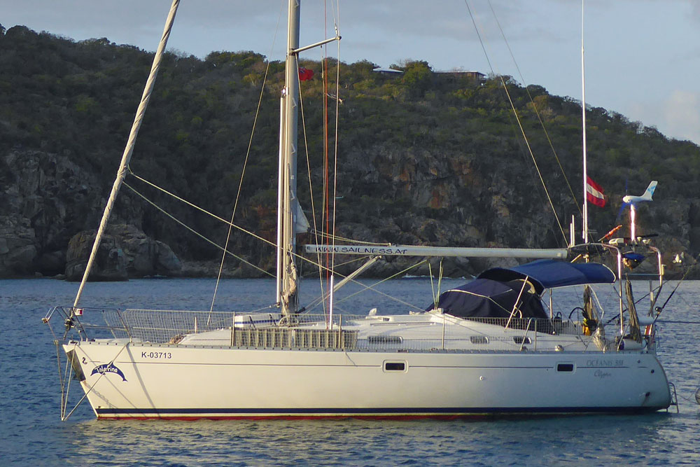 A Beneteau Oceanis 381 sailboat at anchor