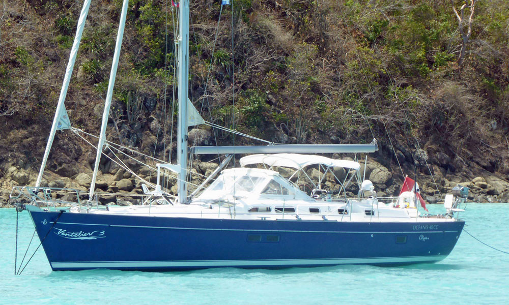 A Beneteau Oceanis 42CC sailboat at anchor