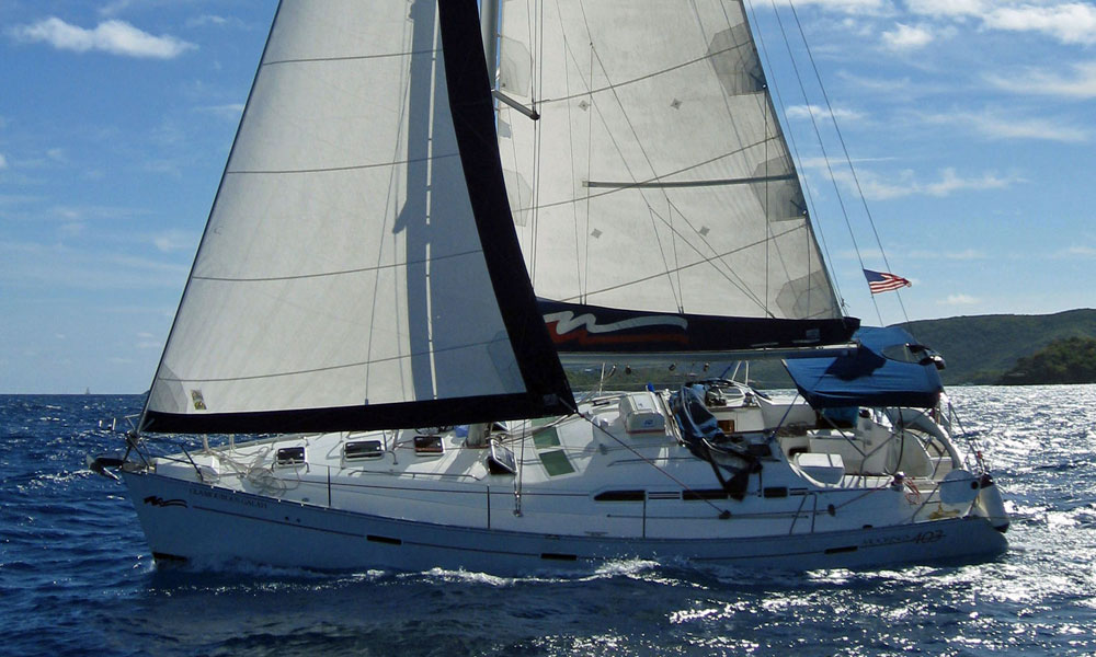 A Beneteau 393 sailboat beating to windward.