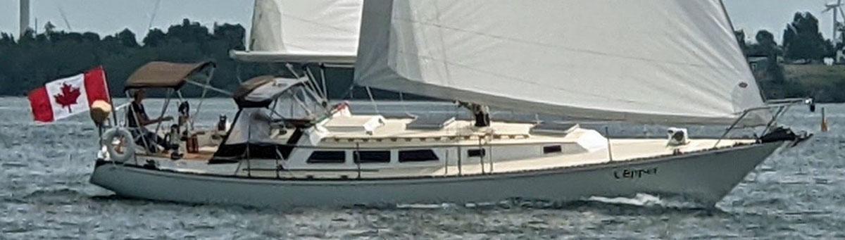 A Newport 41 flying a Canadian ensign