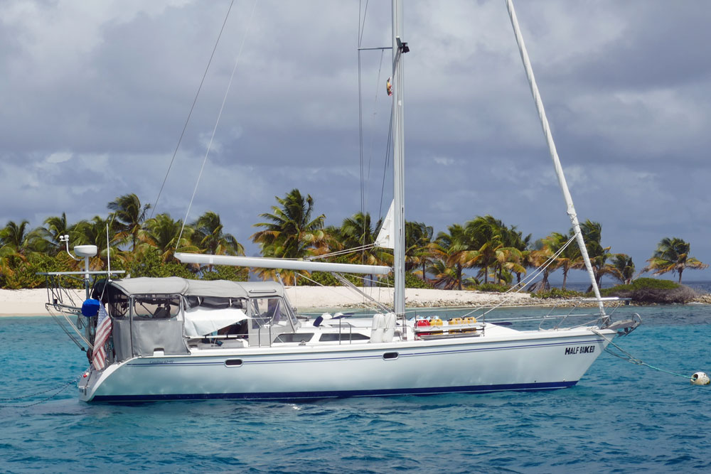 A Catalina 42 MkII sailboat on a mooring ball off Sandy Island, near Carriacou in the West Indies