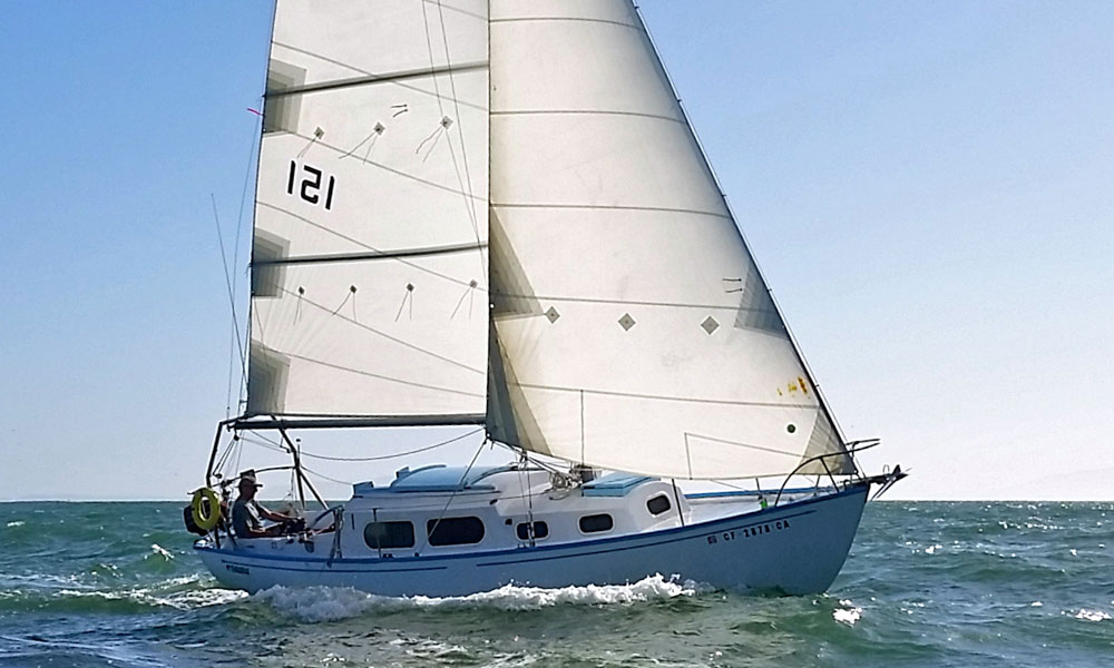 A Columbia 29 sailing in perfect conditions