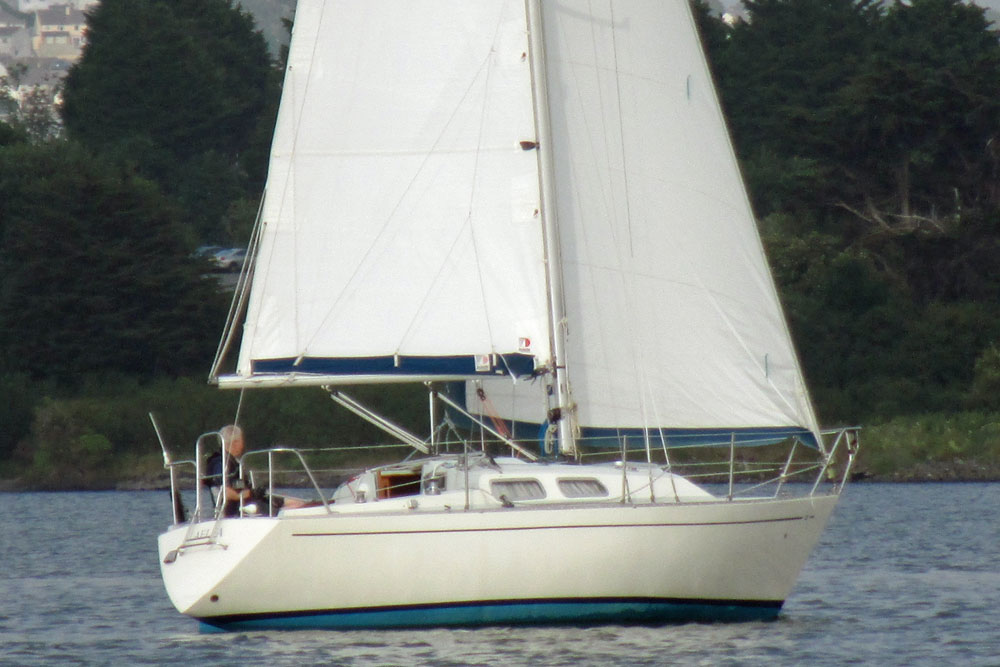A Contessa 28 sailboat underway