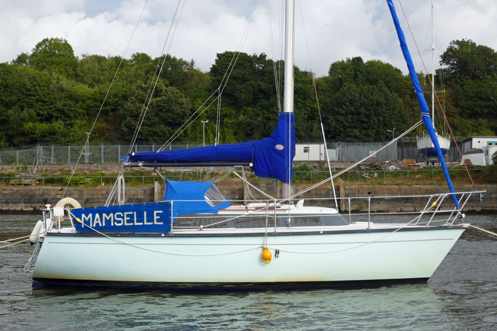 A Dufour 2800 sailboat on a mooring