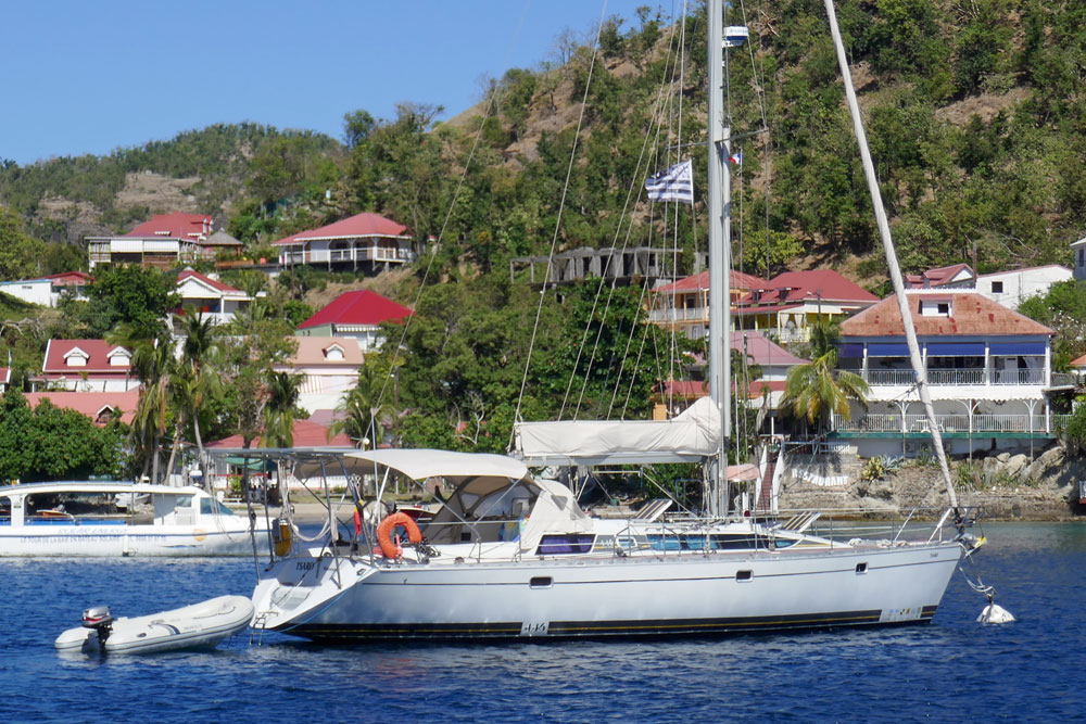 A Feeling 446 sailboat on a mooring ball