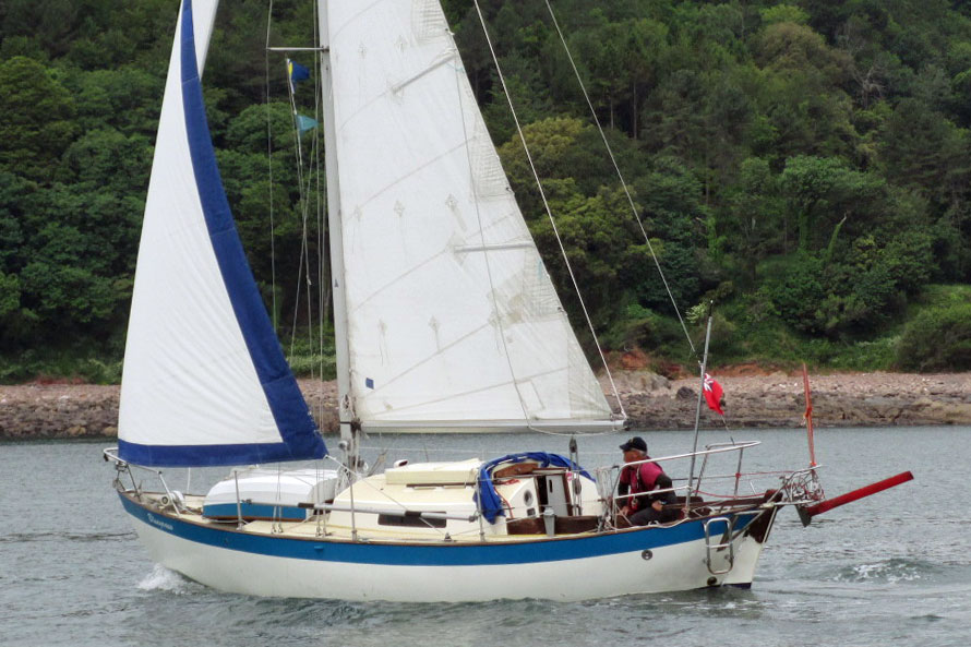 The Francis 26 sailboat under full sail
