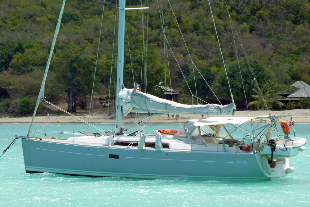 A Hanse 400 sailboat at anchor in Five Islands Bay, Antigua in the West Indies