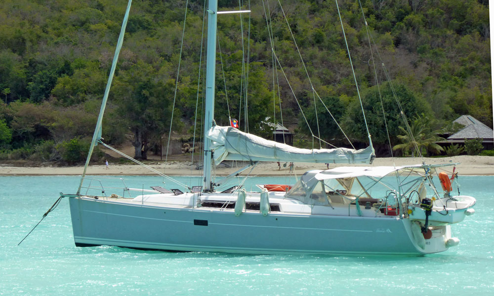 A Hanse 400 sailboat at anchor in Five Islands Bay, Antigua