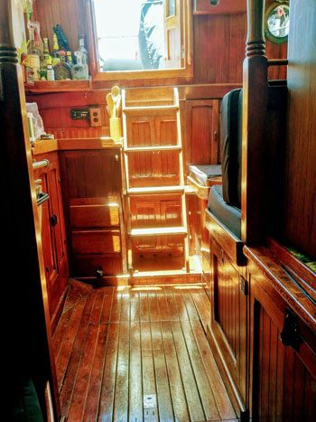 Extensive and beautiful teak wood interior in this Hardin Seawolf 40 ketch