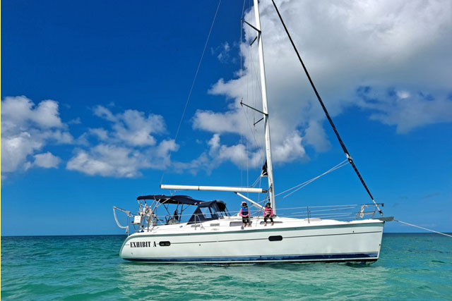 A Hunter 365 sailboat at anchor