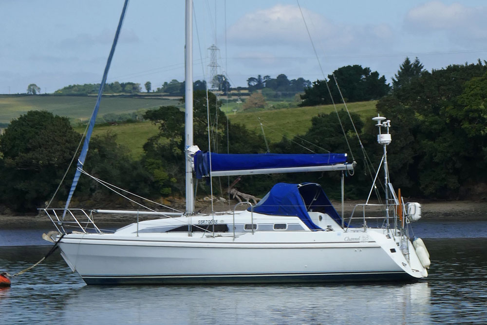 A Hunter Channel 323 sailboat moored on the River Tamar in the UK