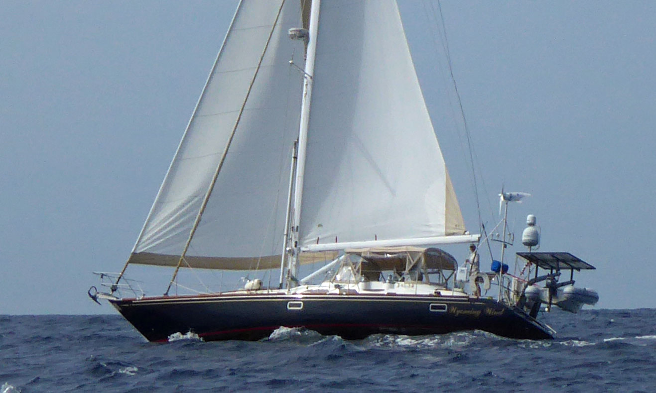 A Hunter 49 cruising yacht powers to windward