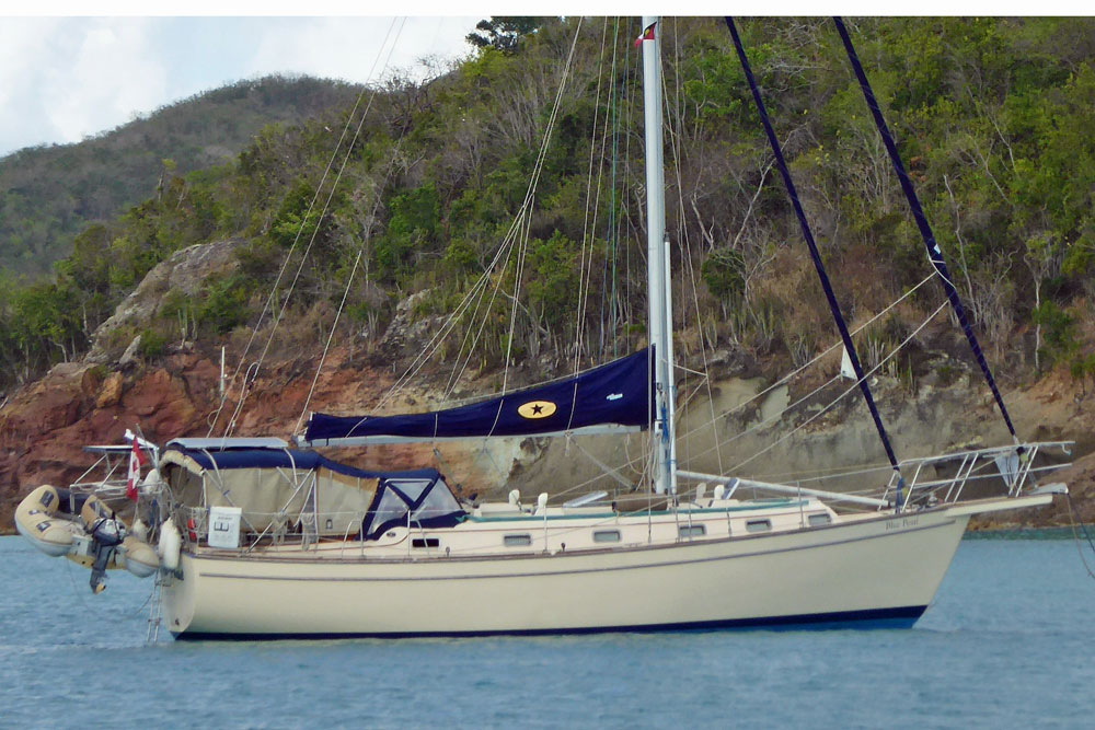 'Blue Pearl', an Island Packet 38 sailboat at anchor in Five Islands Bay, Antigua