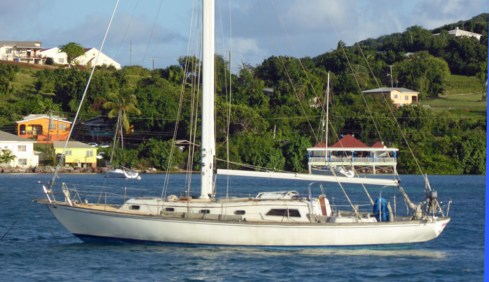 Islander 44 sailboat with alternative coachroof, at anchor in Falmouth Harbour, Antigua