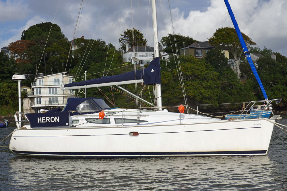 A Jeanneau Sun Odyssey 35 sailboat moored fore-and-aft