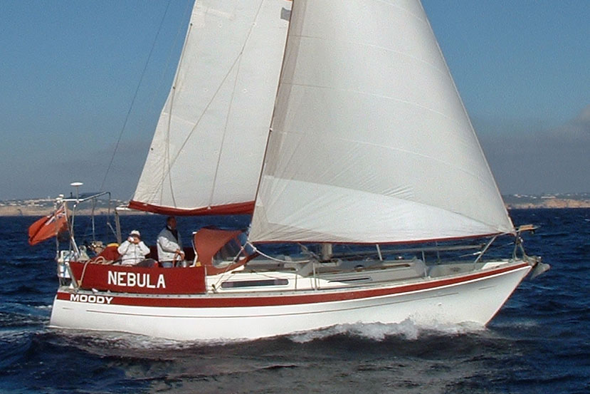 A Moody 33 sailboat under sail
