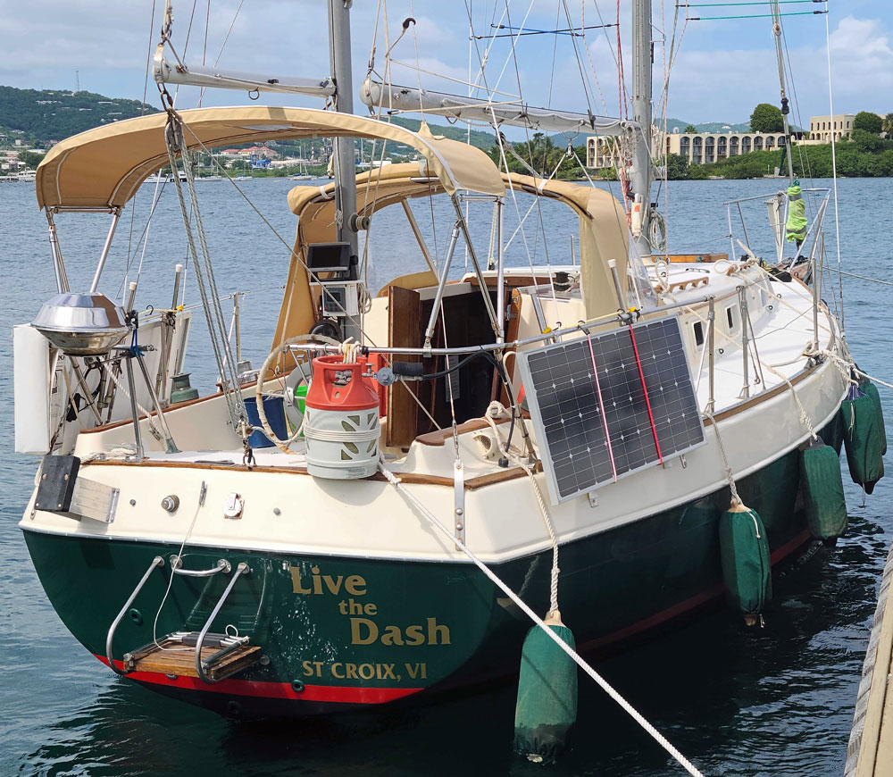 Morgan Out Island 37 alongside, stern