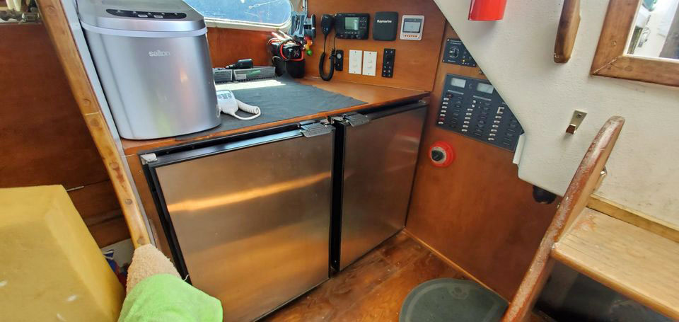 A Morgan 41 Out Island ketch chart table with fridge/freezer below