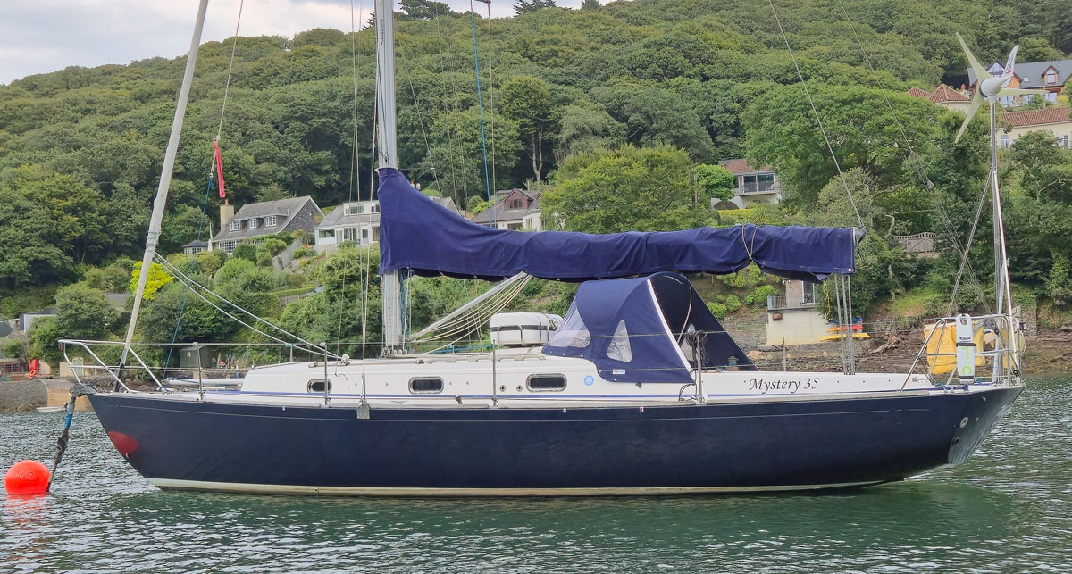A Mystery 35 sailboat moored on the Yealm in Devon, UK