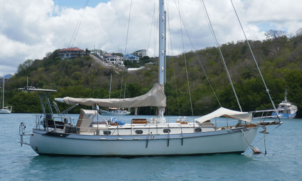 A Tayana 37 cruising cutter on a mooring