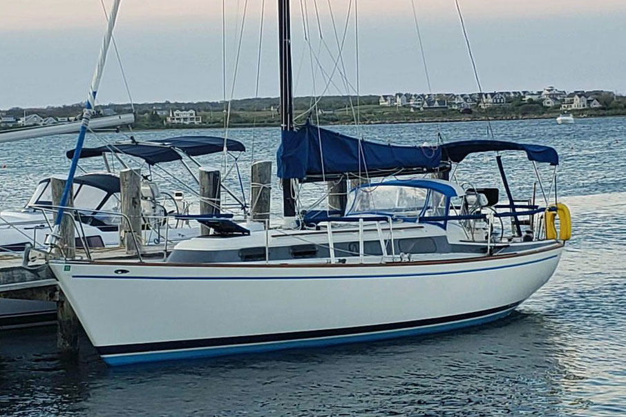 A Pearson 323 moored alongside a dock