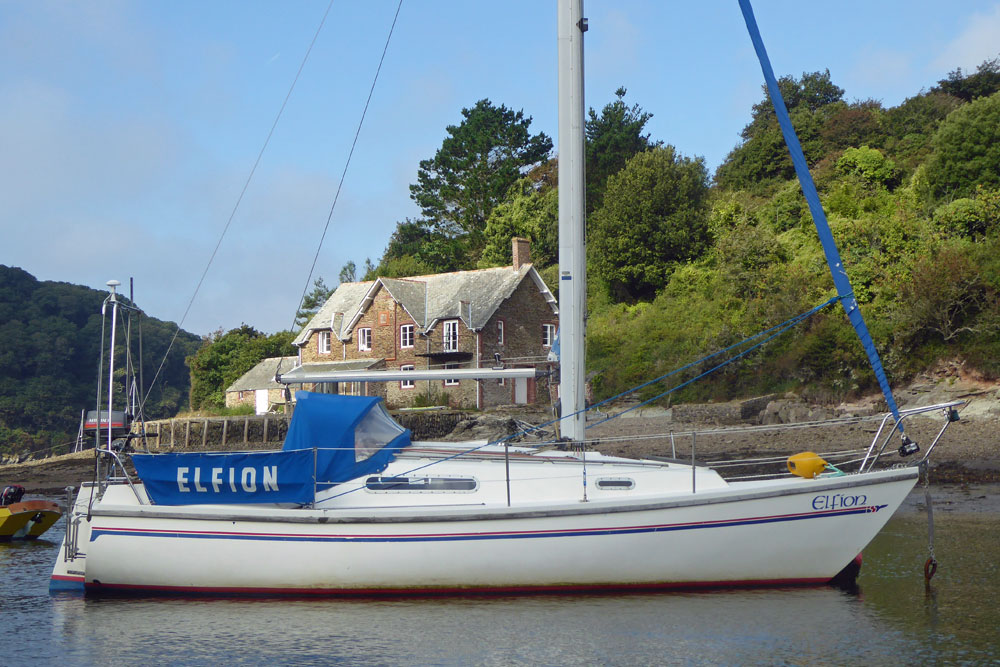 A Sadler 26 sailboat moored in the River Yealm, Devon, UK