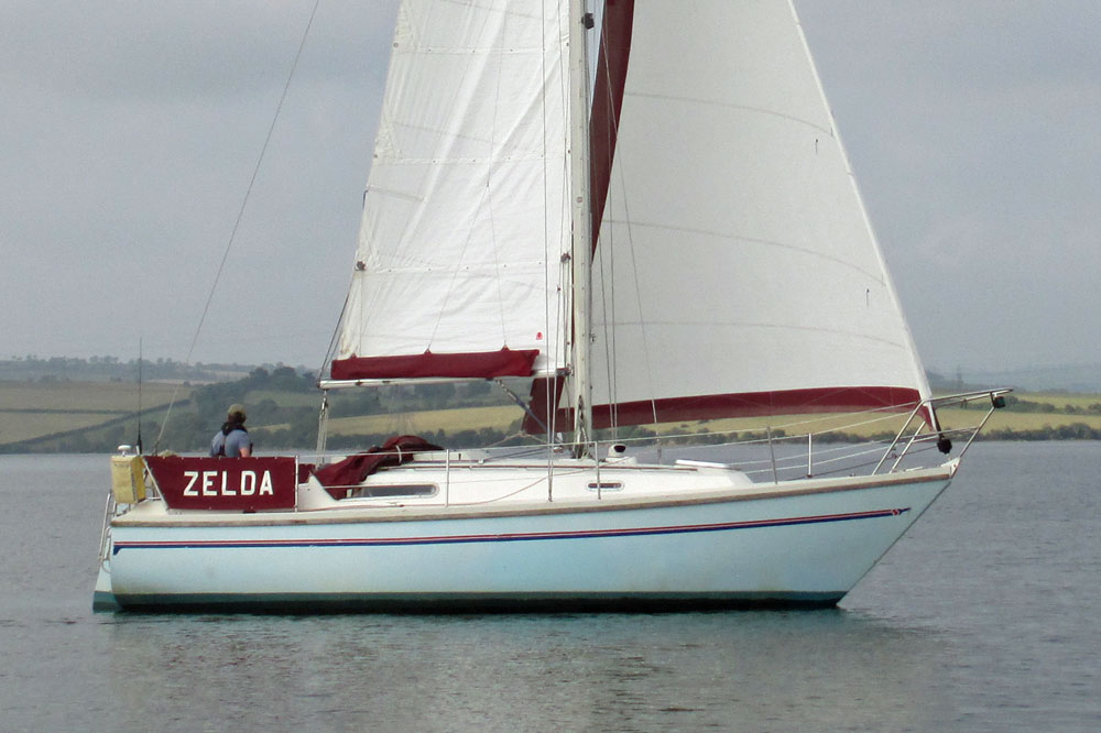 A Sadler 29 sailboat under sail in light airs
