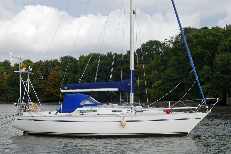 A Sadler 32 sailboat moored on the River Tamar in southwest England