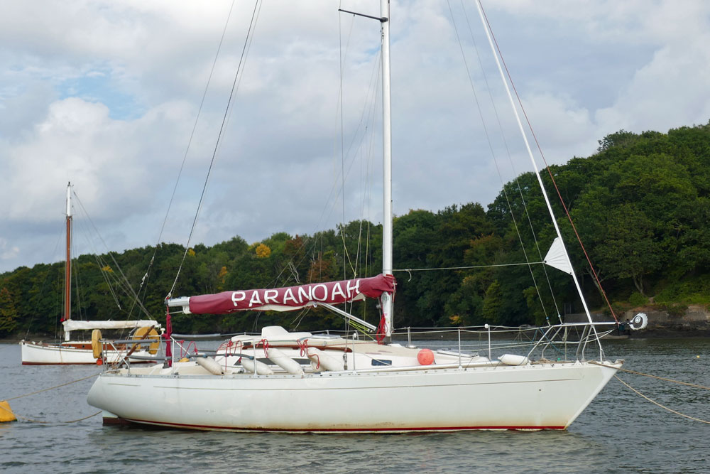 A Sigma 33 sailboat on a mooring ball