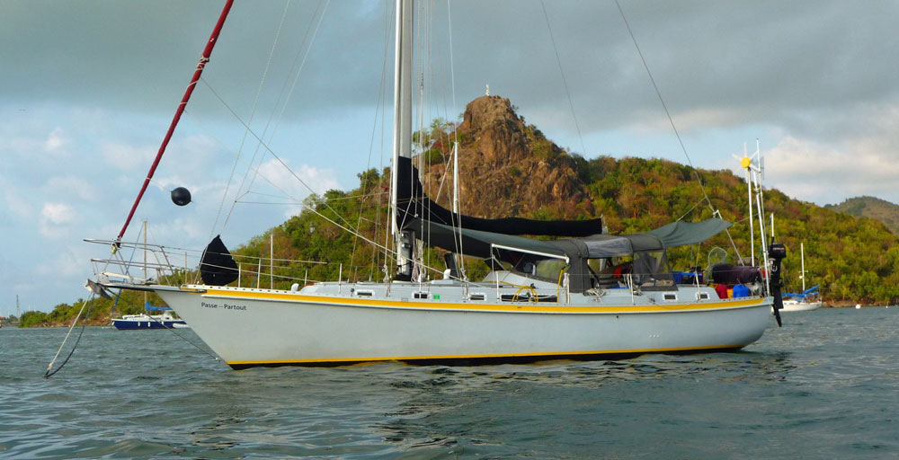 A sailboat at anchor in Simpson Bay Lagoon in St Maarten, one of the Leeward Islands of the Caribbean.