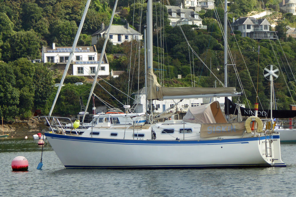 A Vancouver 274 moored on the River Yealm at Newton Ferrers in Devon, UK
