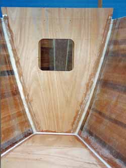 building in a collision bulkhead and watertight chamber on a wood epoxy cedar strip self build boat project