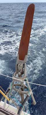 An Aries windvane self-steering gear on the stern of s/y Alacazam
