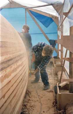 cedar strip sailboat hull sanded smooth ready for sheathing