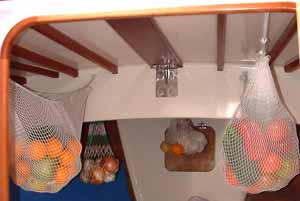 net hammocks for storing fruit on passage in a sailboat