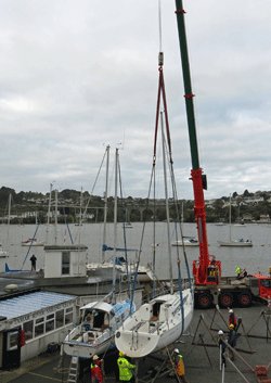 Craning out a sailboat for the winter layup