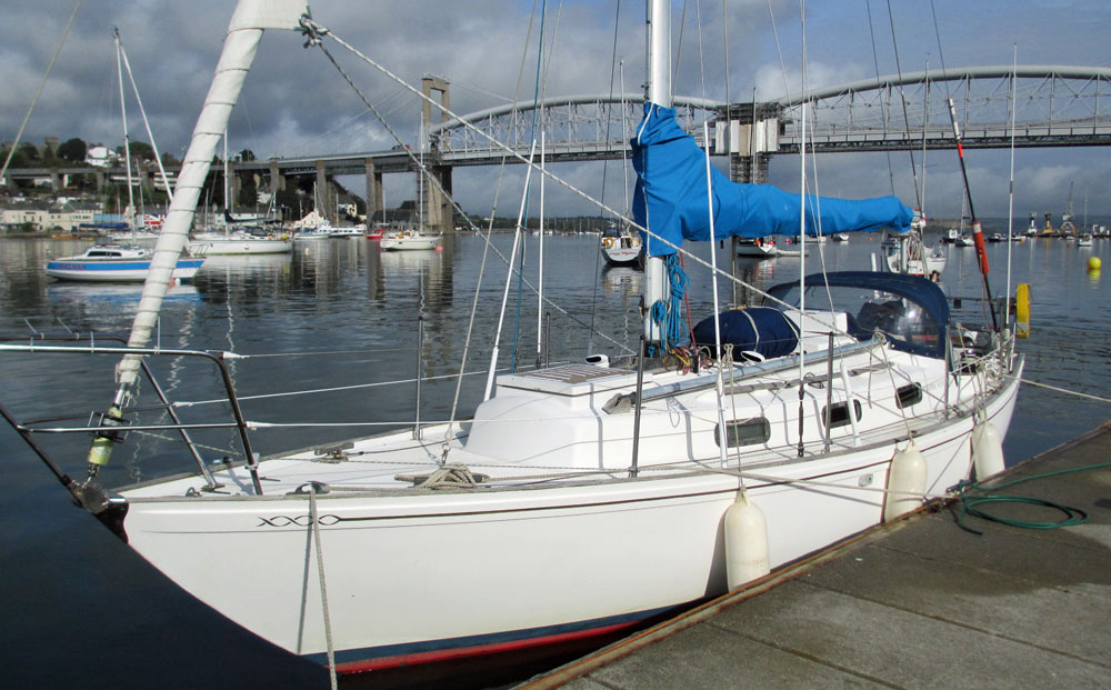 A Twister 28 moored alongside the Tamar River Sailing Club in Plymouth UK